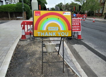 A roadworks sign on Ewell Road celebrating the NHS during the COVID-19 lockdown.