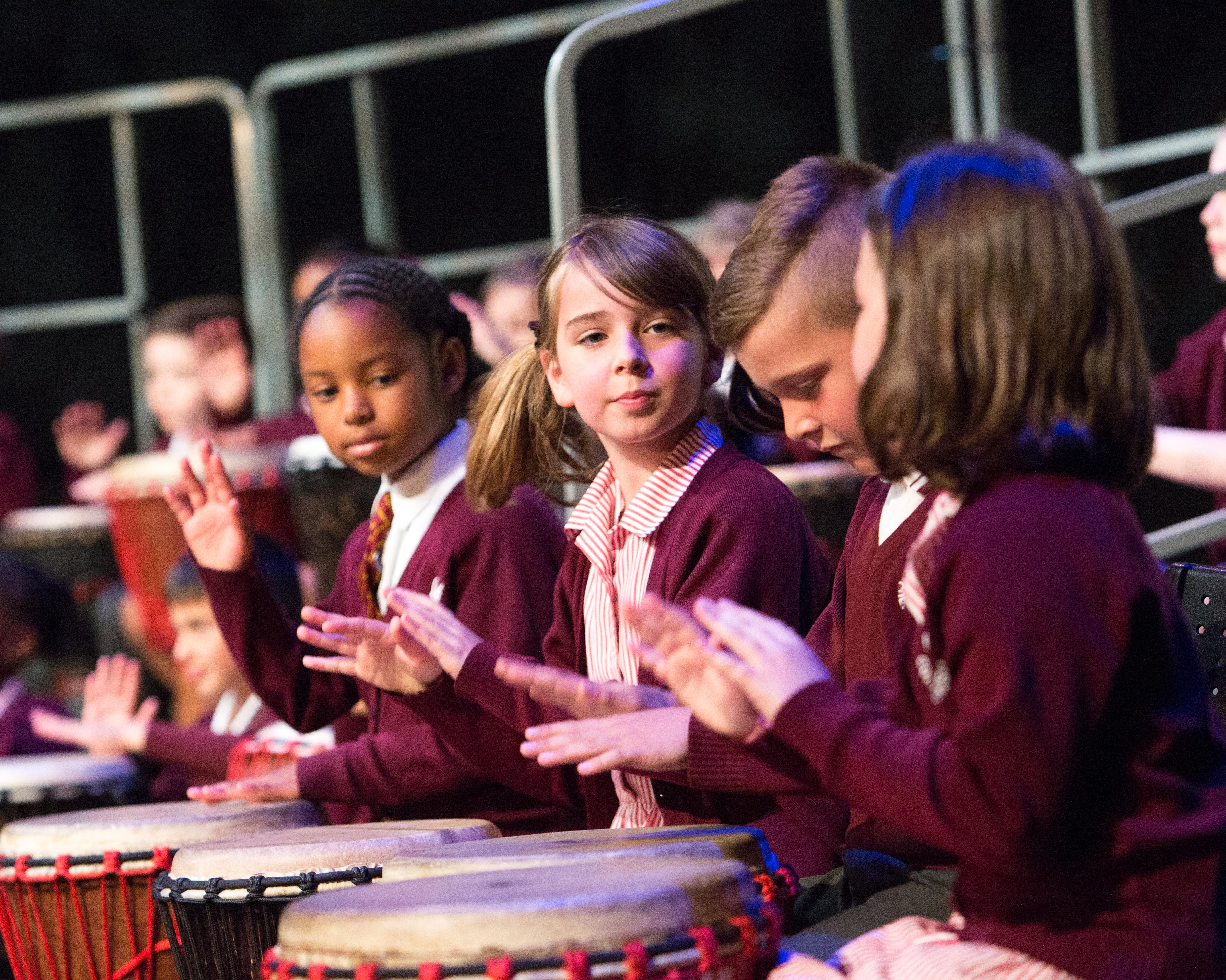 Children playing drums