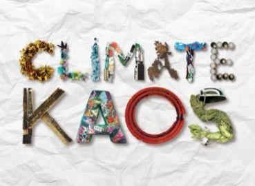 &#039;Climate KAOS&#039; spelt out with recycled waste items such as fabrics, plastic bottles etc.