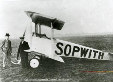 A monoplane from the 1910's built by Sopwith with the name Sopwith painted on the side.