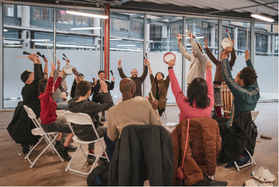 People cheering in a circle