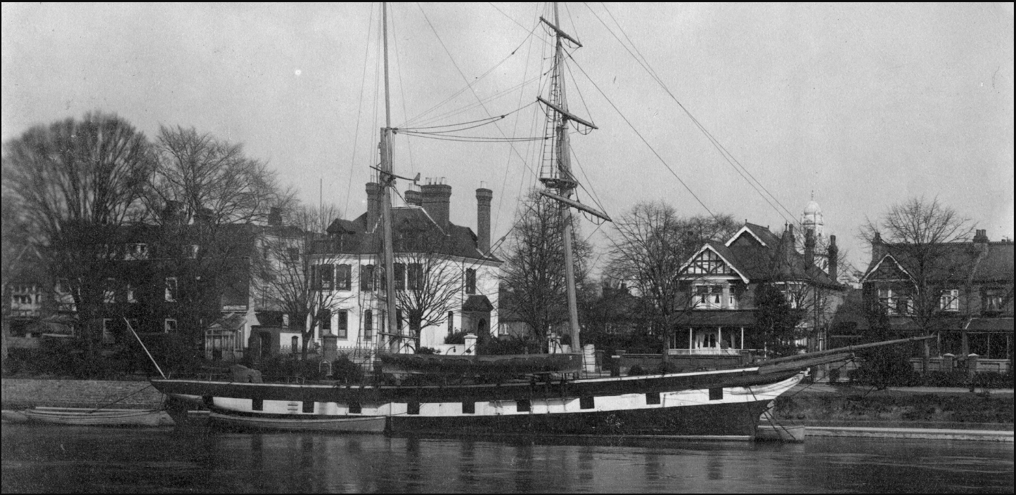 a big sailing ship on a river