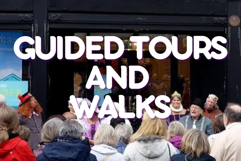 text reading guided tours and walks with an image of people walking as the background