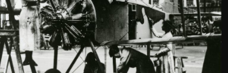 two men working on a plane